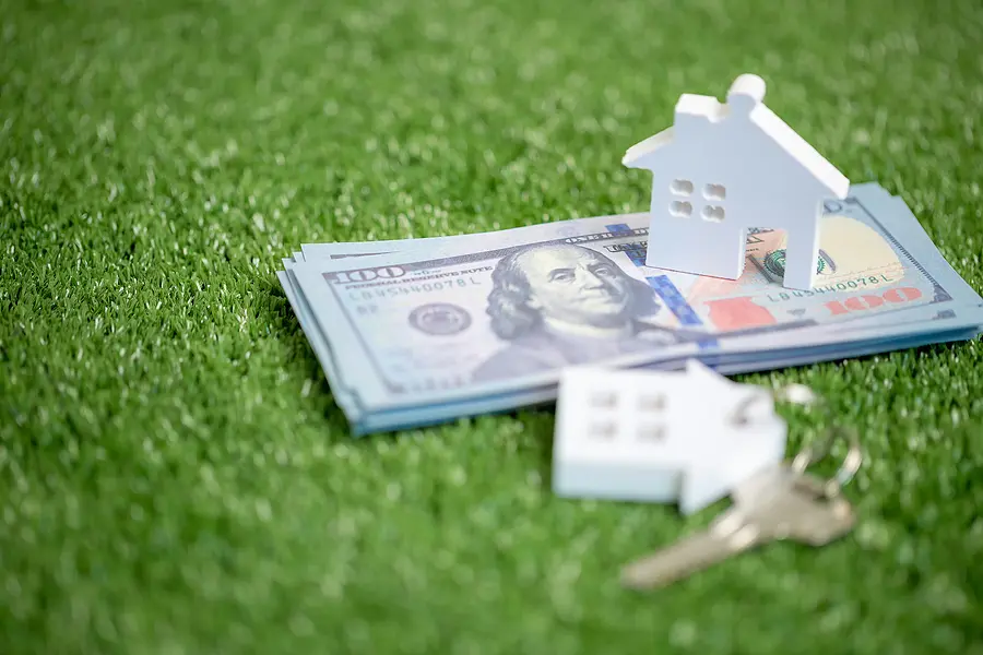 House Property Mortgage With Cash Money Dollar Bill On Table Con